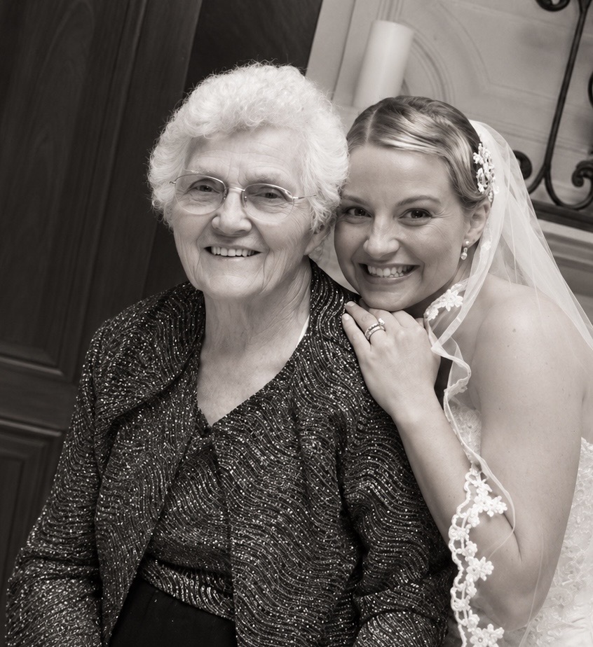 Kristen smiling with her grandmother on her wedding day